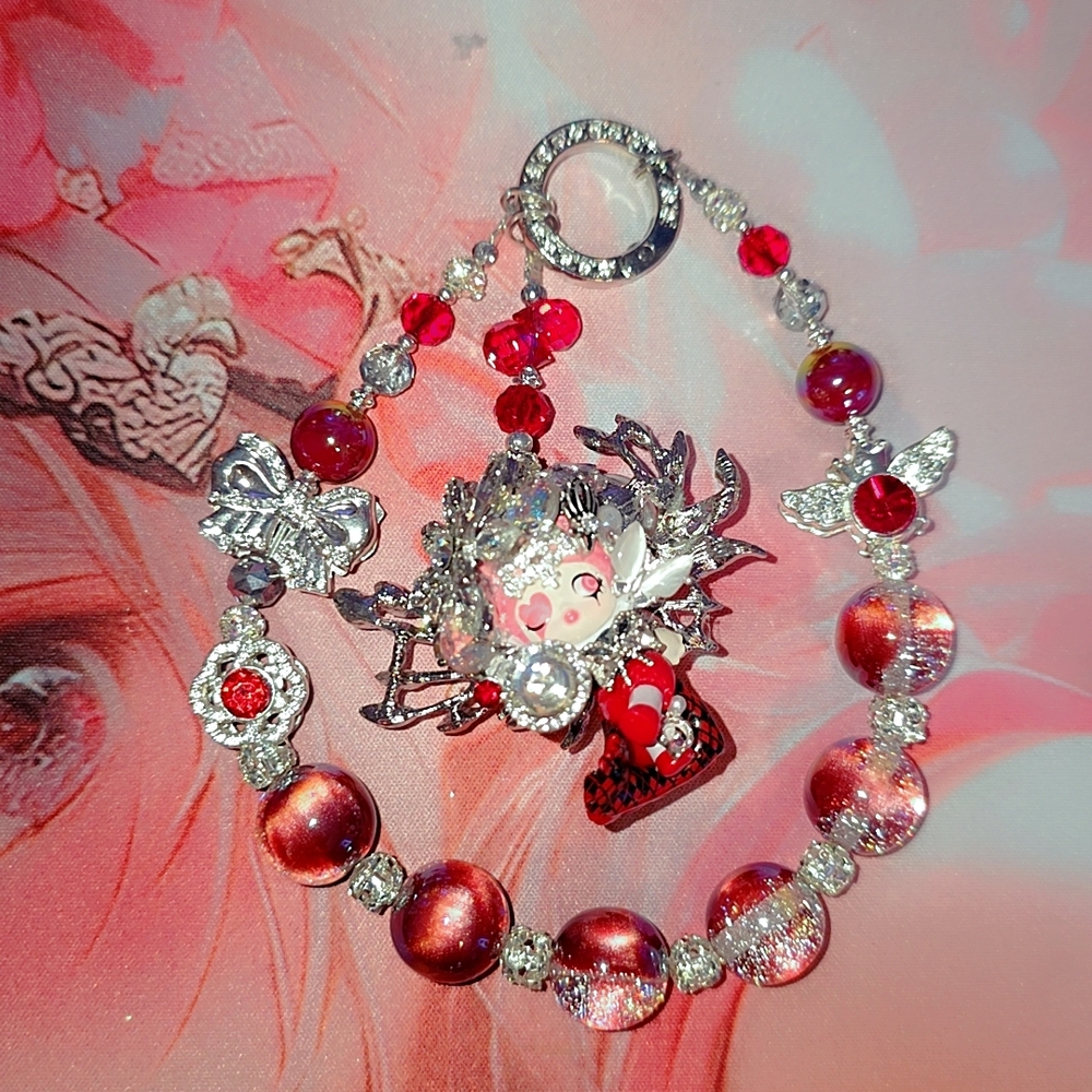 Charming Silver and Red Bracelet with Angel Accents